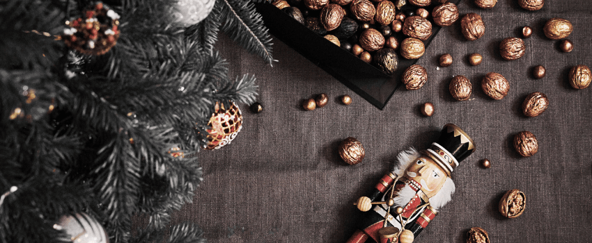 Nutcracker among golden walnuts